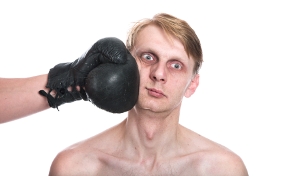 image of boxer taking a punch